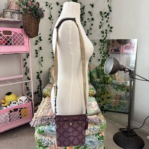 Coach Plum Signature Swingpack Crossbody Bag